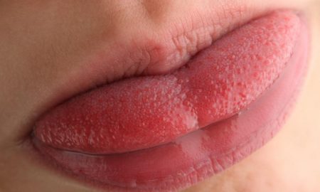 cropped taste buds on person s tongue