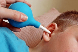 how to remove water from your ears fast