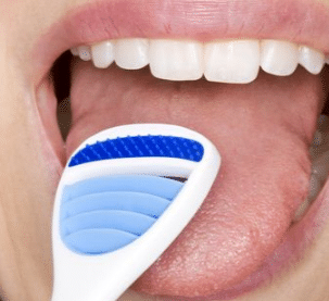 how to use a tongue scraper